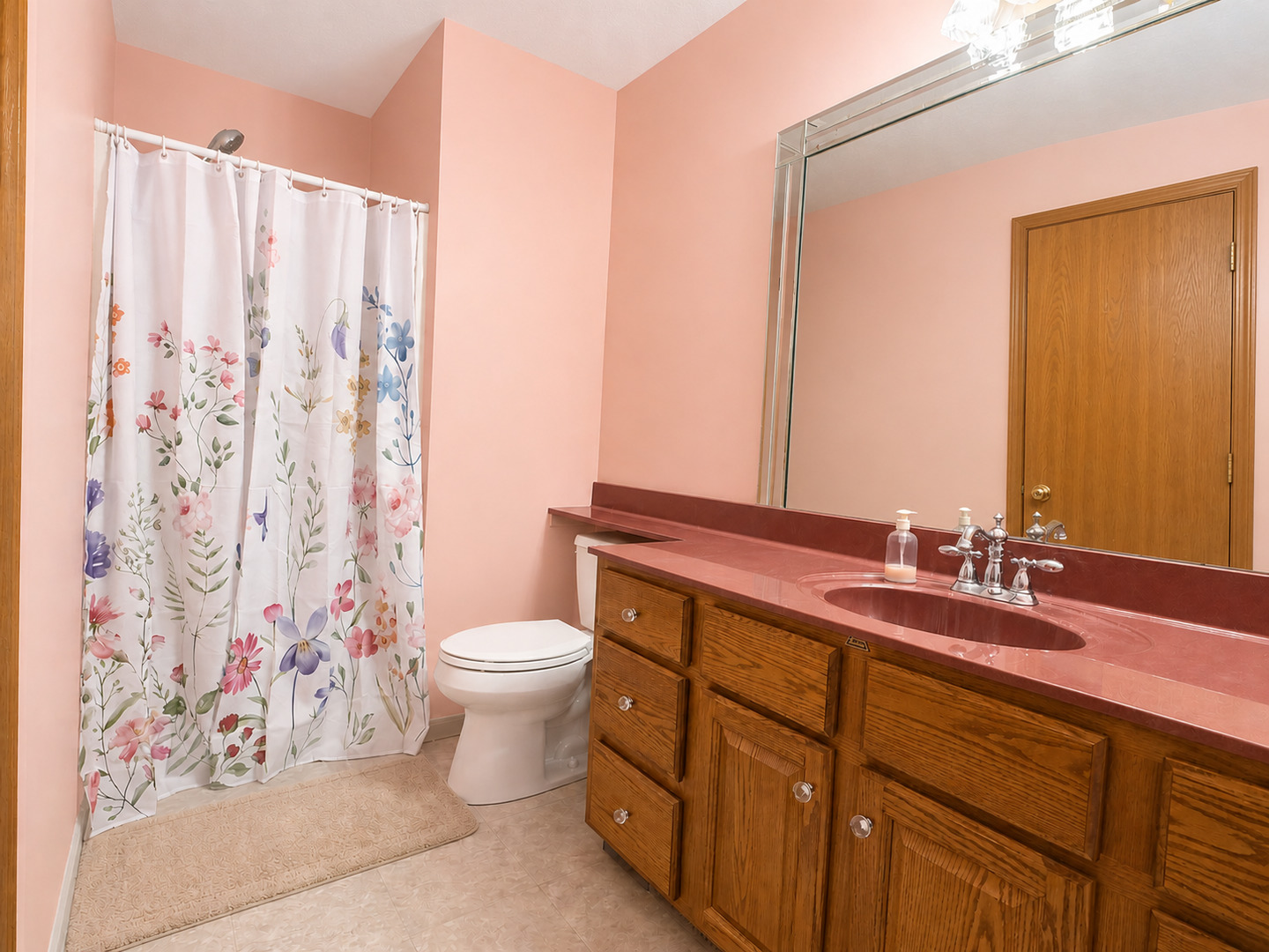 2608 38th Street Moline, IL 61265 - Photo 18 of 18 a bathroom with a toilet sink and mirror