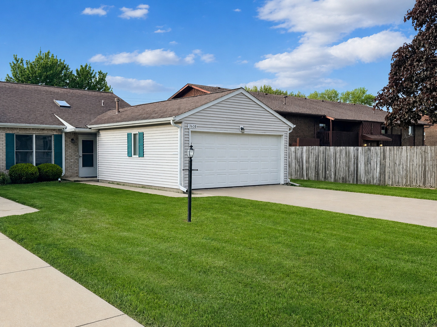 2608 38th Street Moline, IL 61265 - Photo 2 of 18 a view of a backyard with a garden
