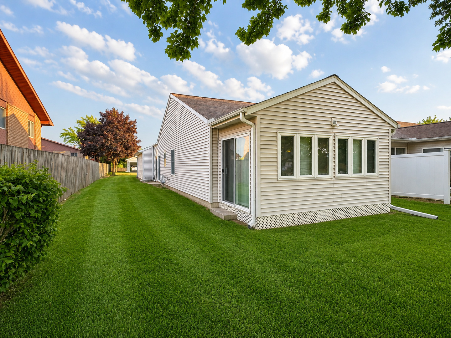 2608 38th Street Moline, IL 61265 - Photo 4 of 18 a view of a house with a yard