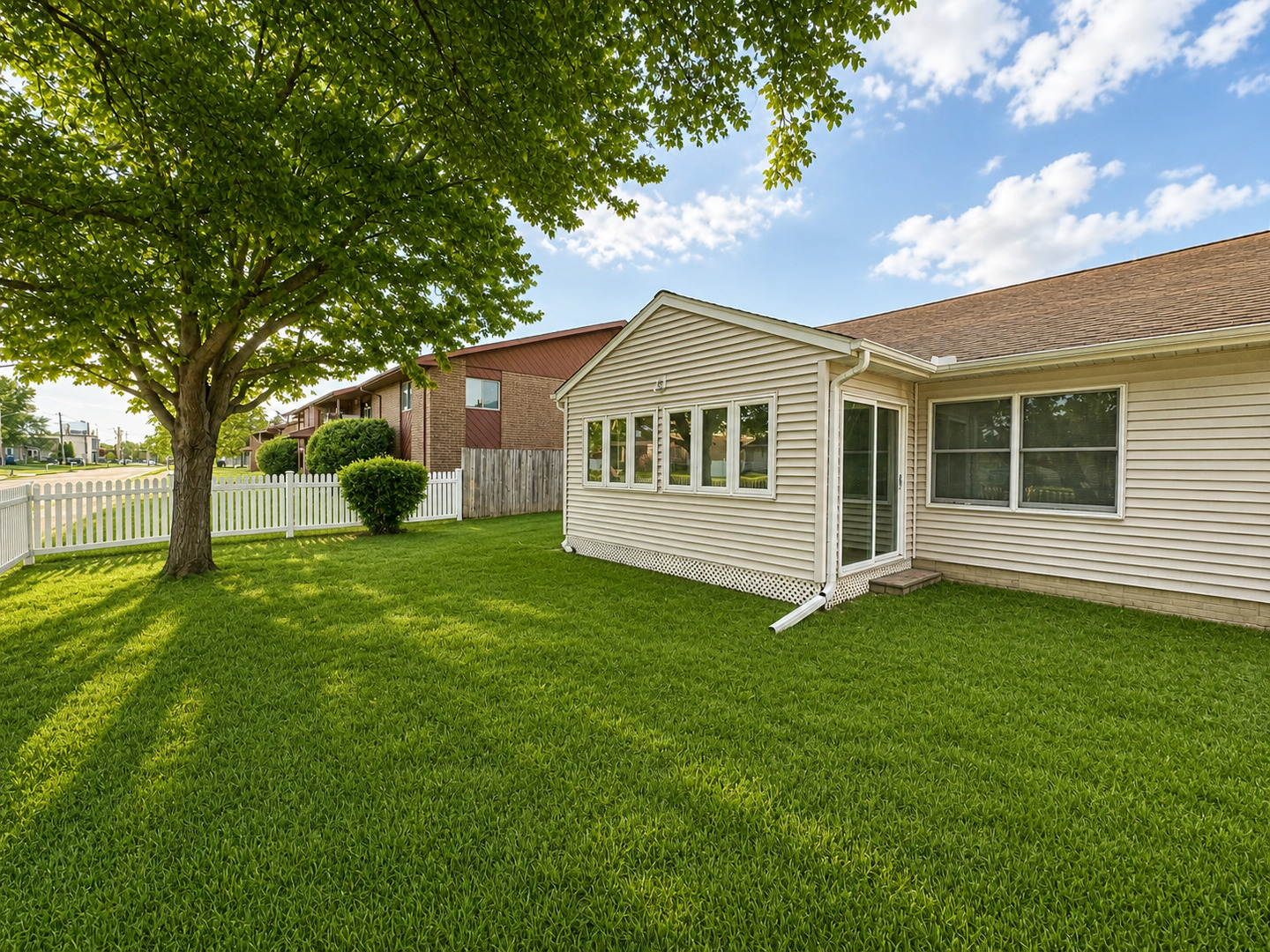 2608 38th Street Moline, IL 61265 - Photo 5 of 18 a view of a house with a backyard