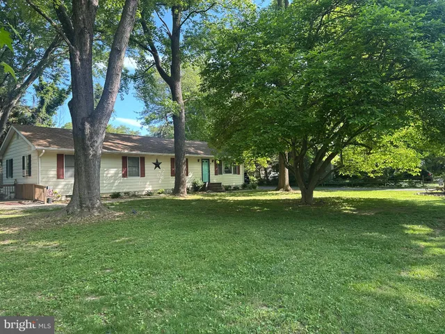 a view of a house with a big yard