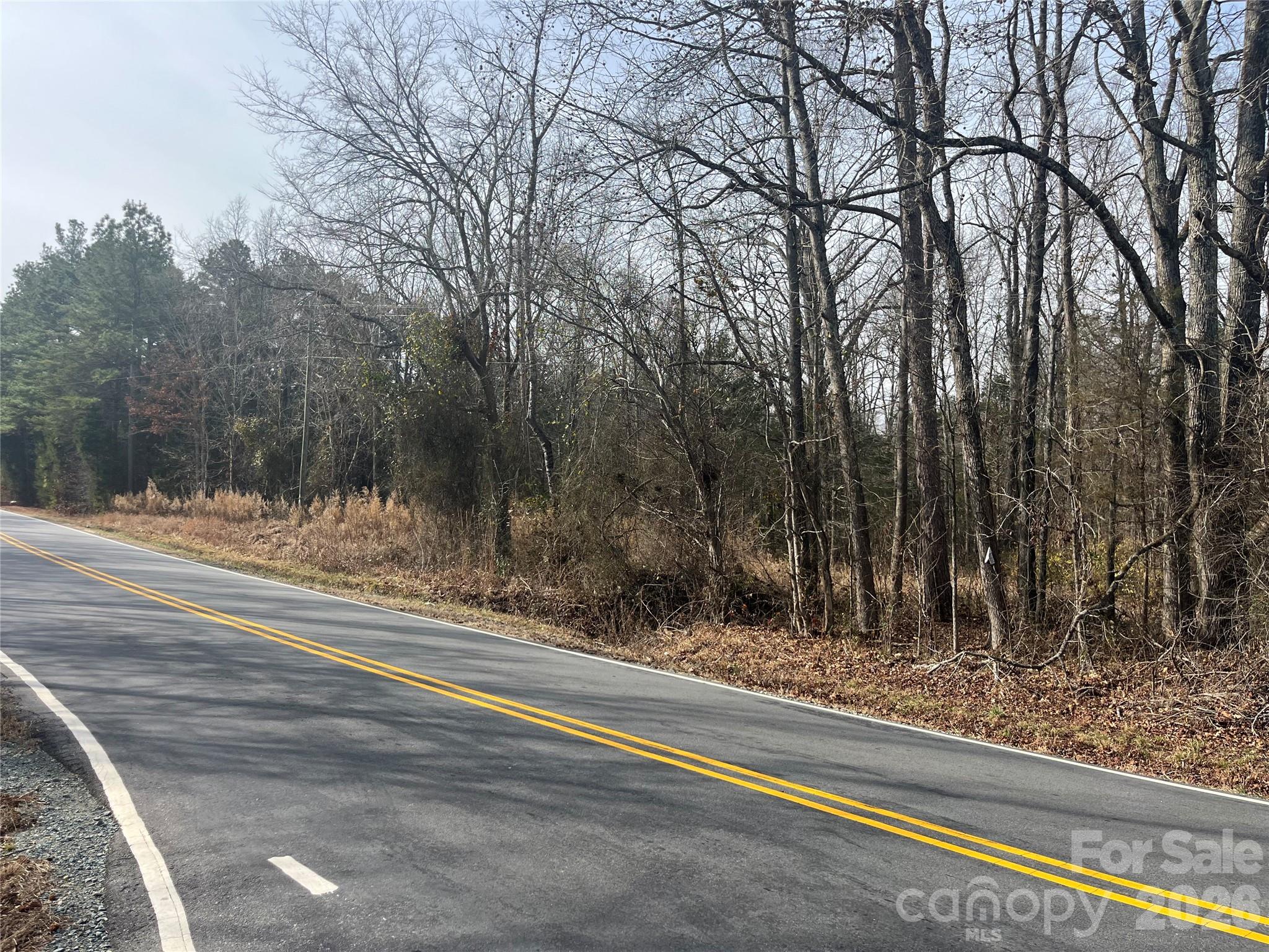 0 Old Union Church Road, Unit 1/2 Salisbury, NC 28146 - Photo 1 of 15 a view of a yard with large trees