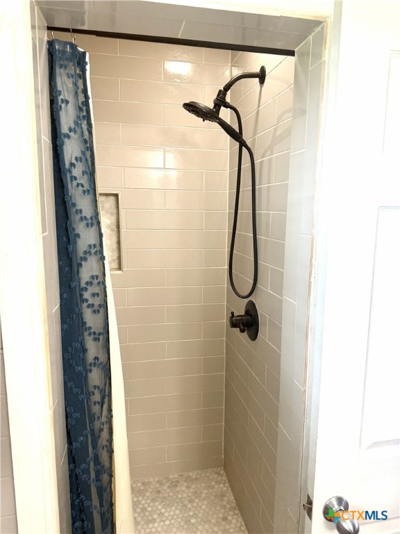 1045 Arnold Road Victoria, TX 77905 - Photo 14 of 15 a bathroom with a shower