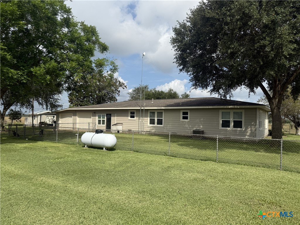 1045 Arnold Road Victoria, TX 77905 - Photo 3 of 15 a front view of house with yard and trees