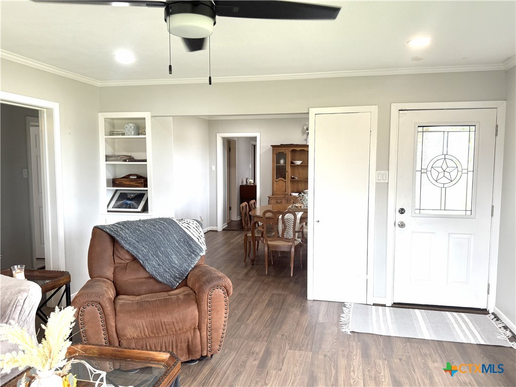 1045 Arnold Road Victoria, TX 77905 - Photo 4 of 15 a living room with furniture and wooden floor