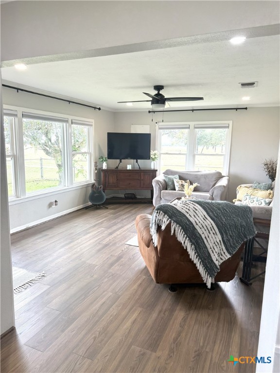 1045 Arnold Road Victoria, TX 77905 - Photo 5 of 15 a spacious bedroom with a bed a couch and large window