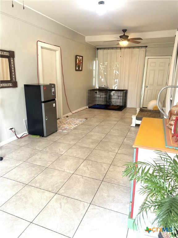 1045 Arnold Road Victoria, TX 77905 - Photo 8 of 15 a living room with a bed and a table