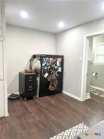 a view of a workspace with furniture