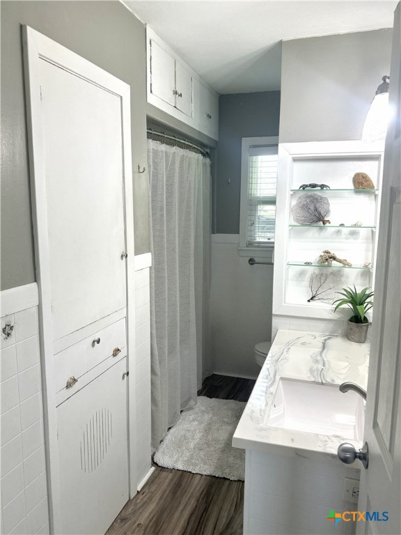 1045 Arnold Road Victoria, TX 77905 - Photo 10 of 15 a bathroom with a sink and a mirror