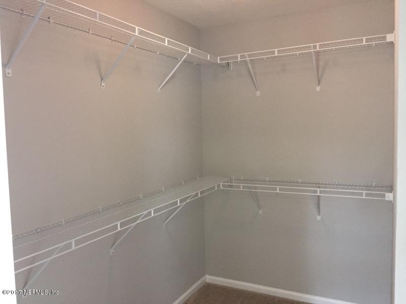 173 Deer Crossing Road St. Augustine, FL 32086 - Photo 24 of 33 a view of an empty walk in closet