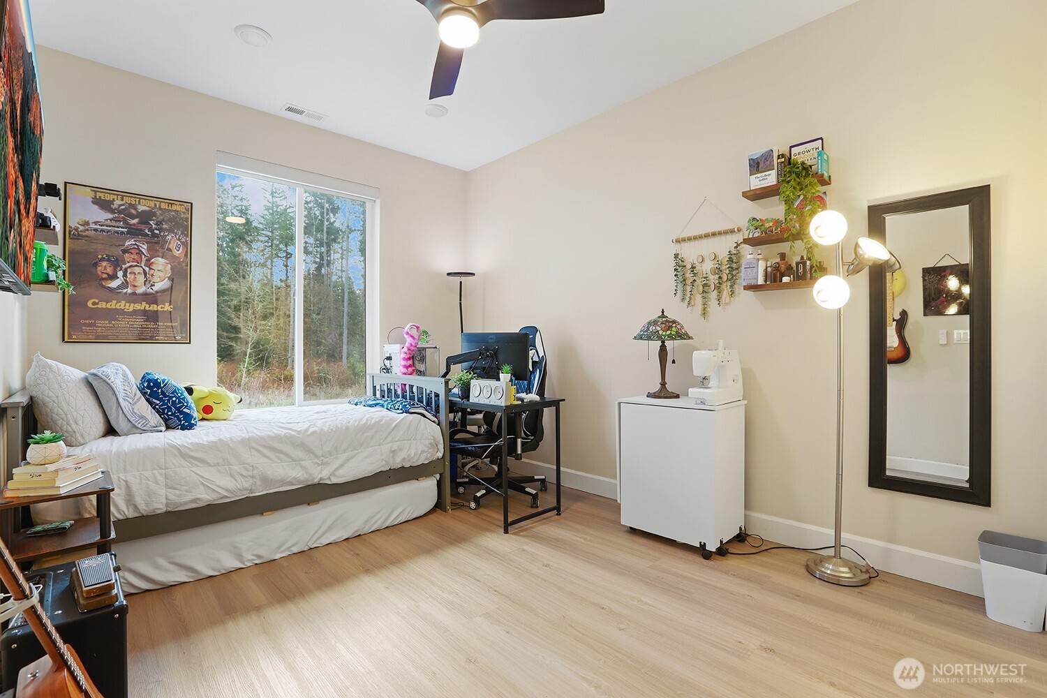 3237 Hilberg Lane Clinton, WA 98236 - Photo 12 of 40 a bedroom with a bed and large windows