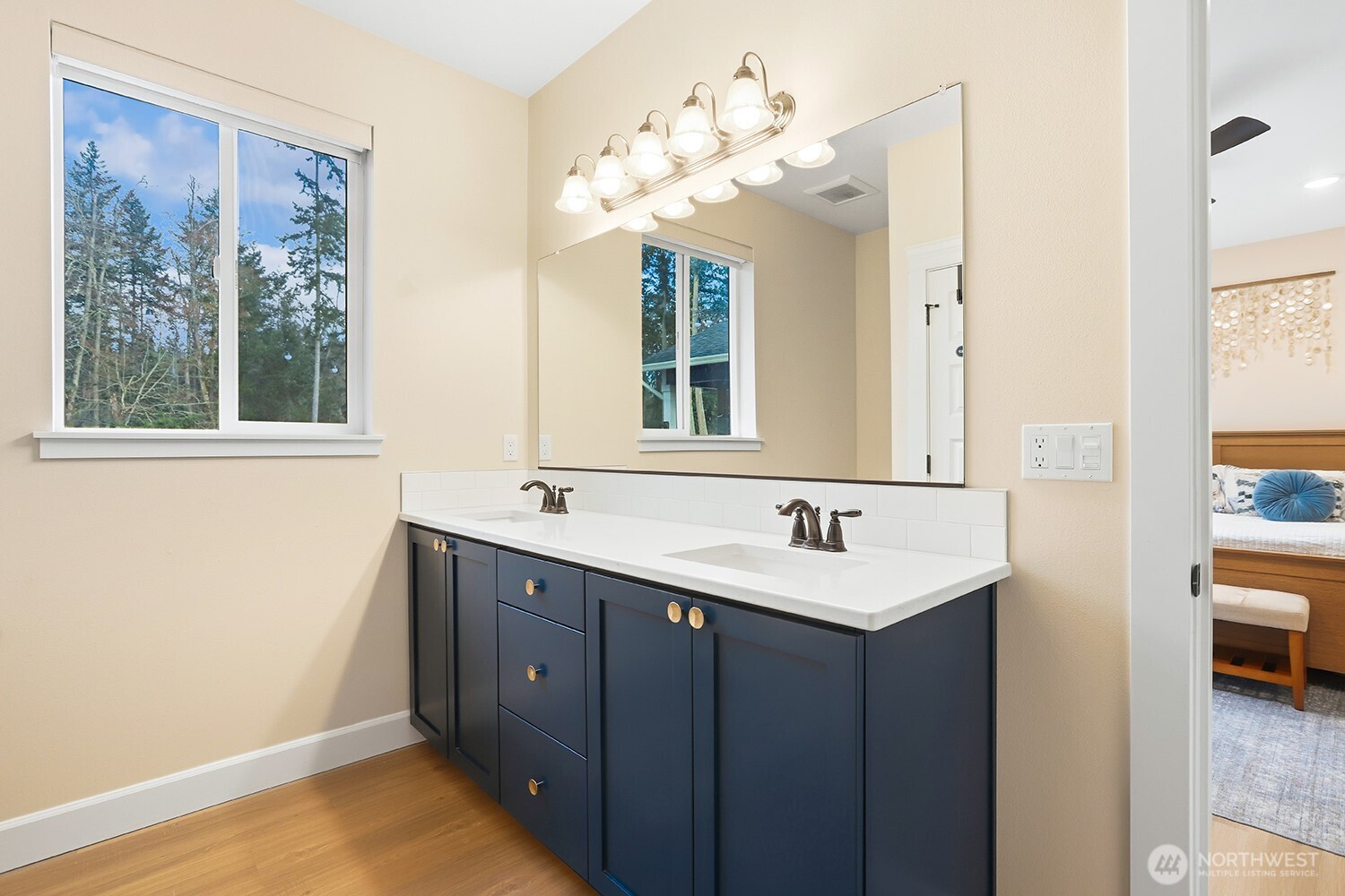 3237 Hilberg Lane Clinton, WA 98236 - Photo 17 of 40 a bathroom with a sink and a mirror