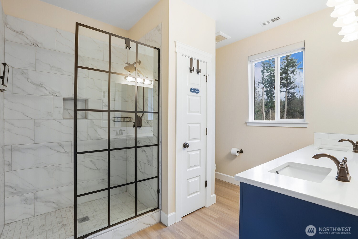 3237 Hilberg Lane Clinton, WA 98236 - Photo 18 of 40 a bathroom with a sink and mirror