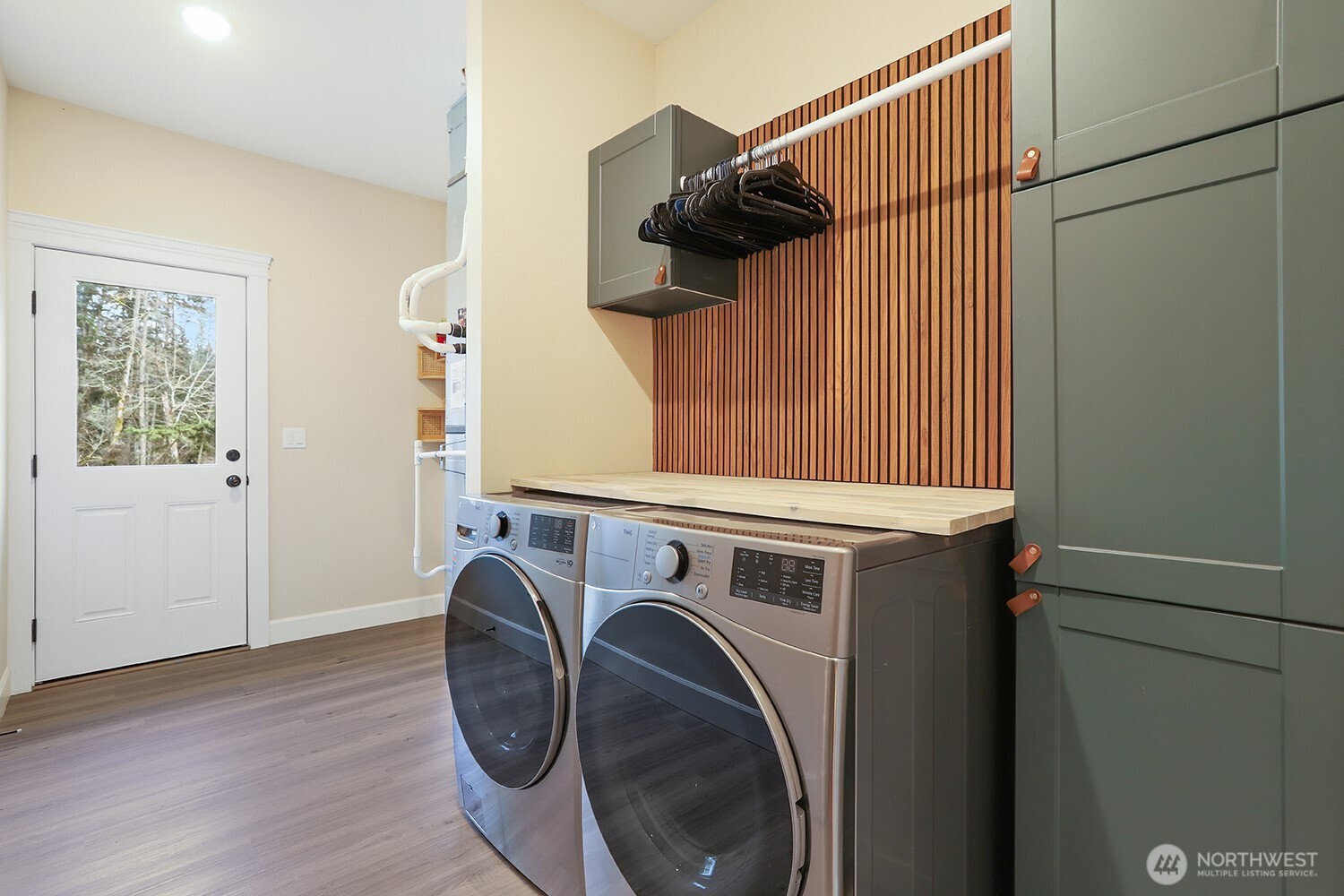 3237 Hilberg Lane Clinton, WA 98236 - Photo 19 of 40 a utility room with dryer and washer