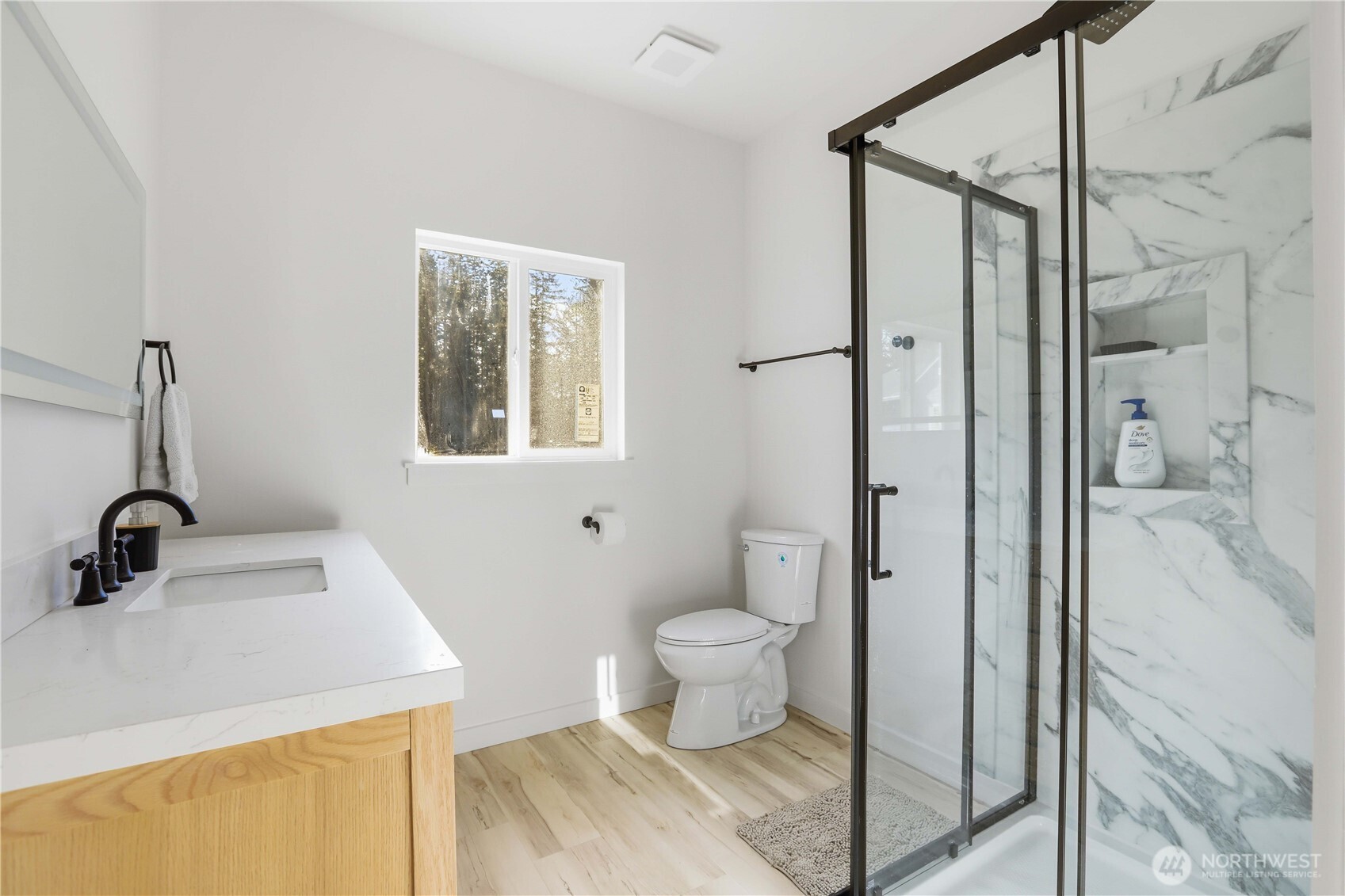 3237 Hilberg Lane Clinton, WA 98236 - Photo 27 of 40 a bathroom with a sink toilet and shower