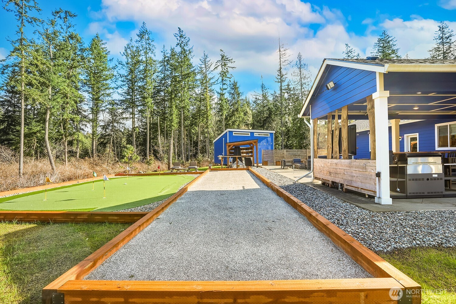 3237 Hilberg Lane Clinton, WA 98236 - Photo 31 of 40 swimming pool view with a garden space