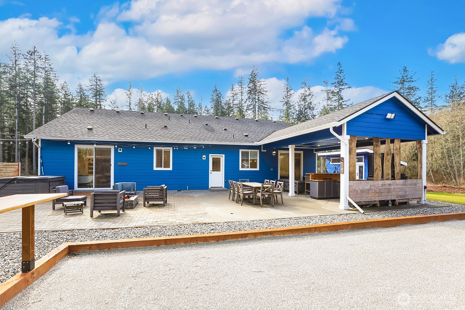 3237 Hilberg Lane Clinton, WA 98236 - Photo 32 of 40 a front view of house with yard outdoor seating and barbeque oven