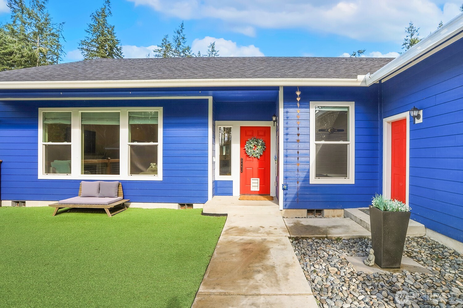 3237 Hilberg Lane Clinton, WA 98236 - Photo 4 of 40 a front view of a house with a yard