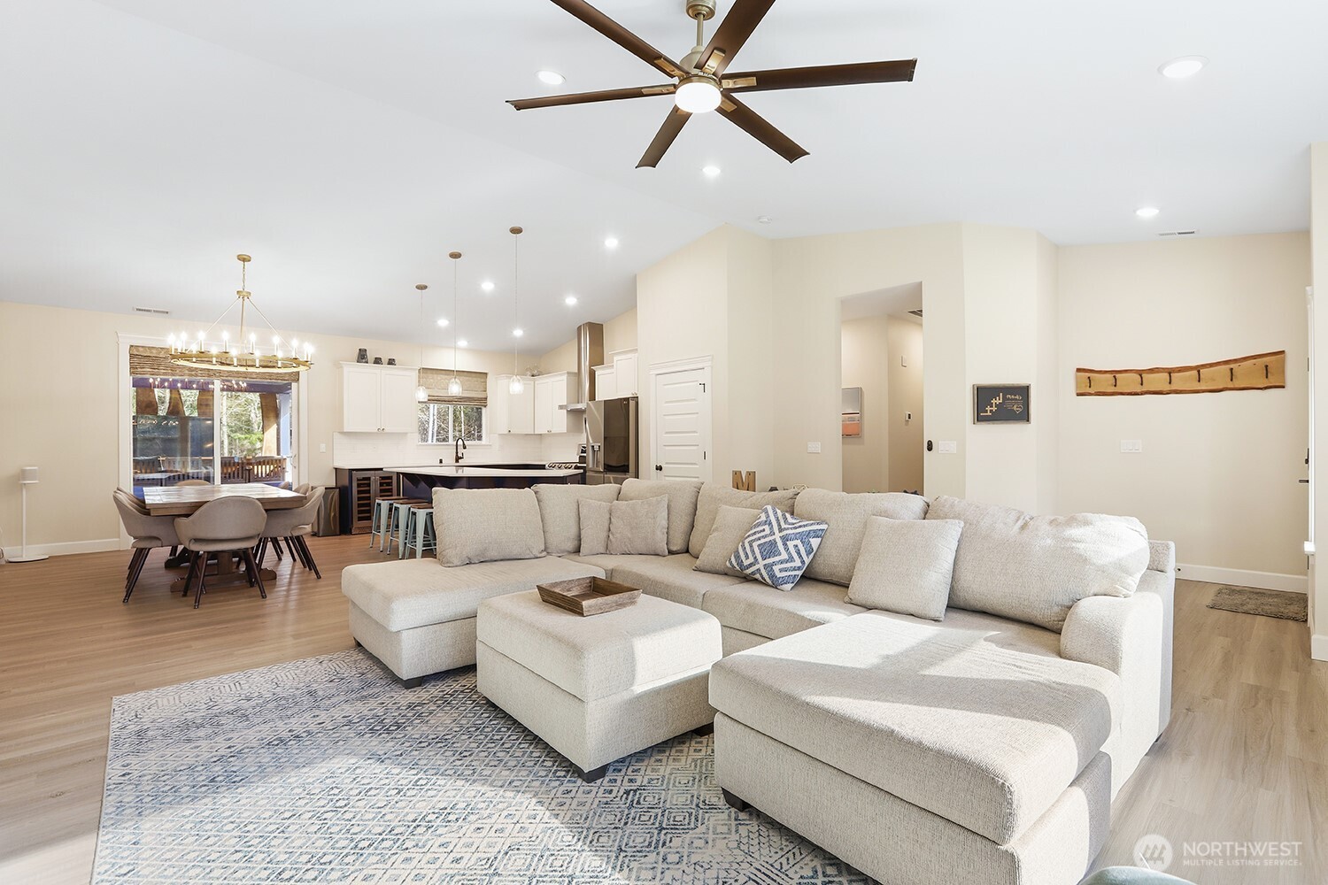 3237 Hilberg Lane Clinton, WA 98236 - Photo 7 of 40 a living room with furniture and a view of kitchen