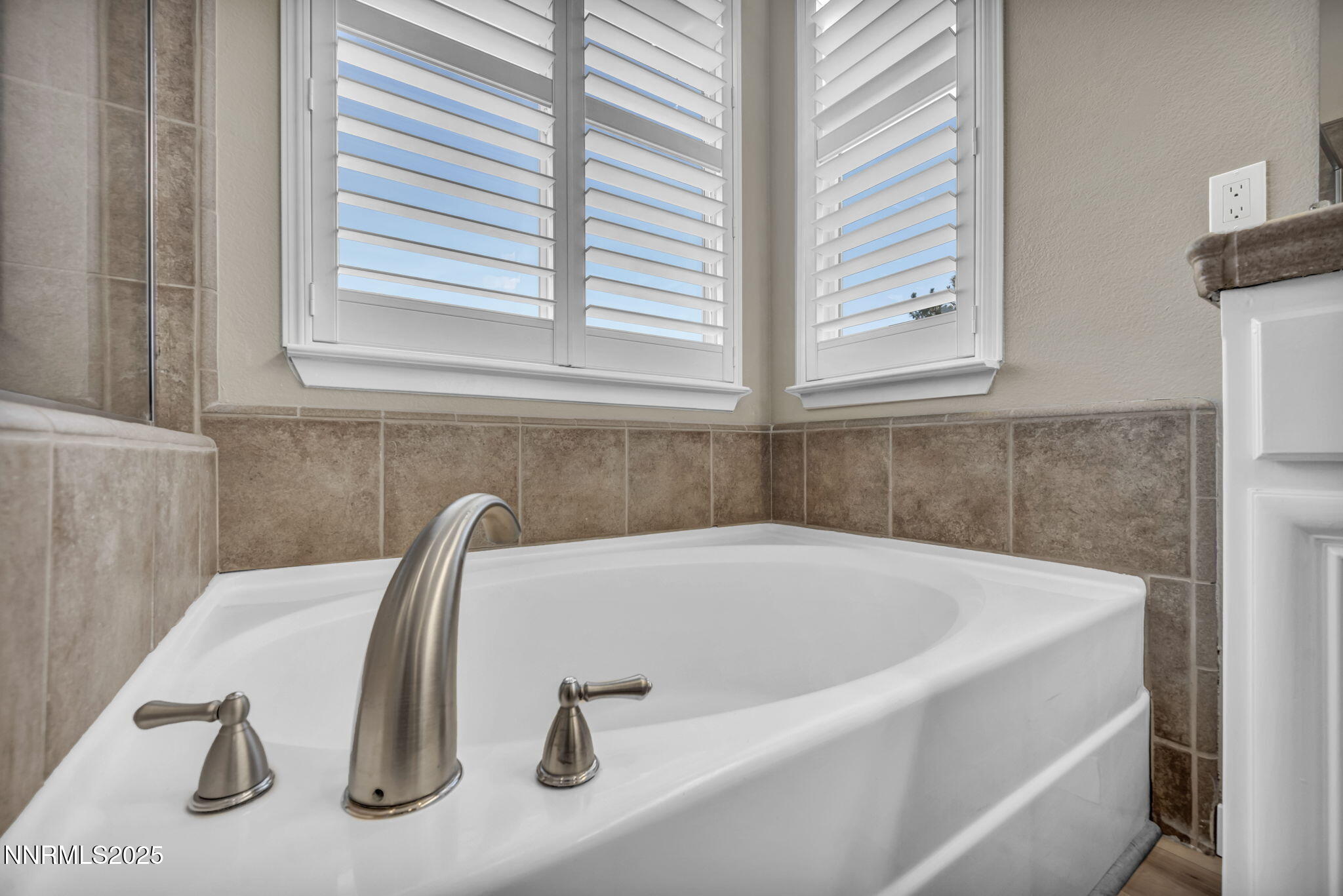 1781 Emerald Bay Drive Reno, NV 89521 - Photo 16 of 42 a bath tub sitting next to a window