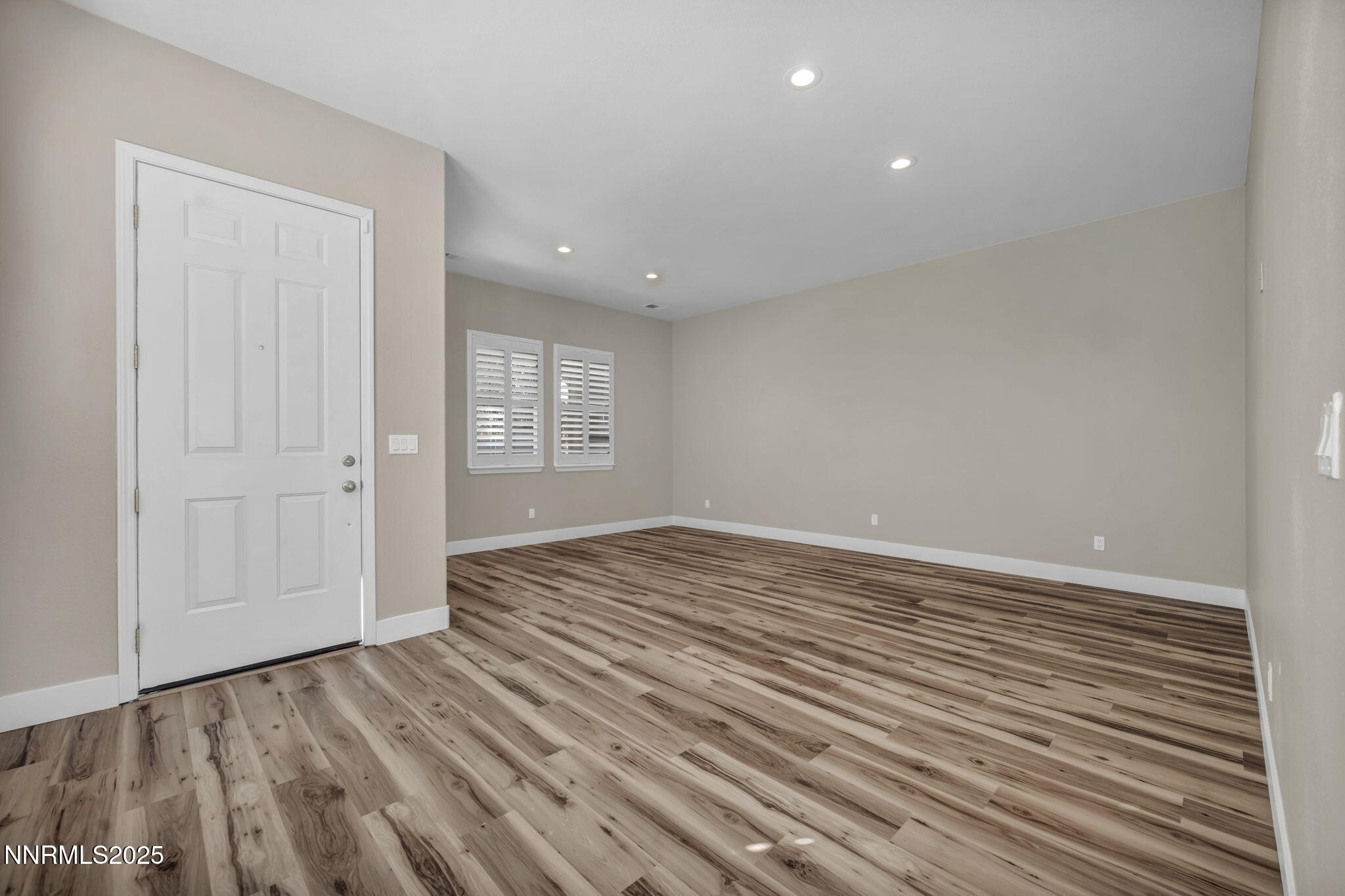 1781 Emerald Bay Drive Reno, NV 89521 - Photo 19 of 42 a view of empty room with wooden floor and fan