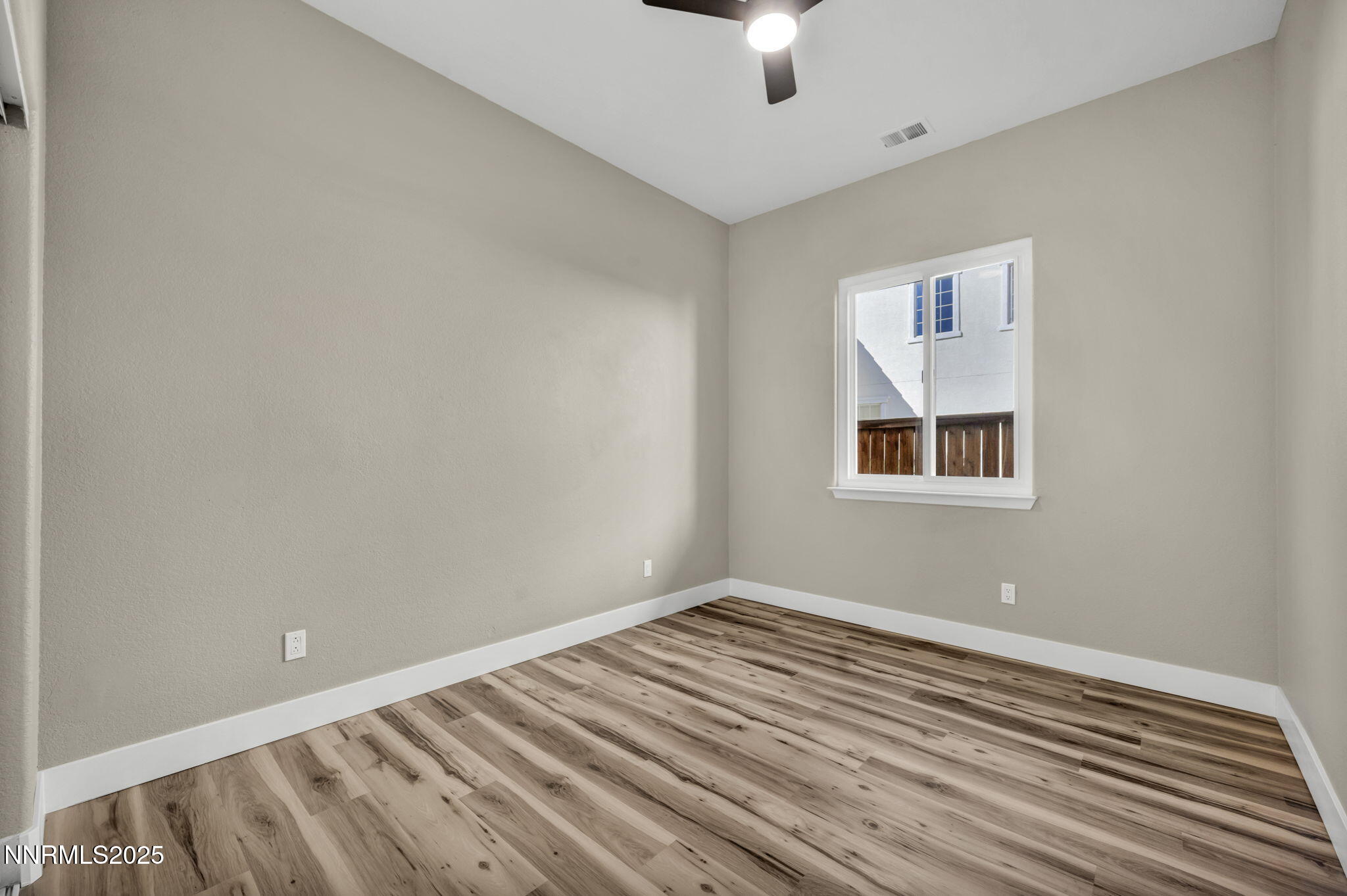 1781 Emerald Bay Drive Reno, NV 89521 - Photo 26 of 42 a view of a room with wooden floor