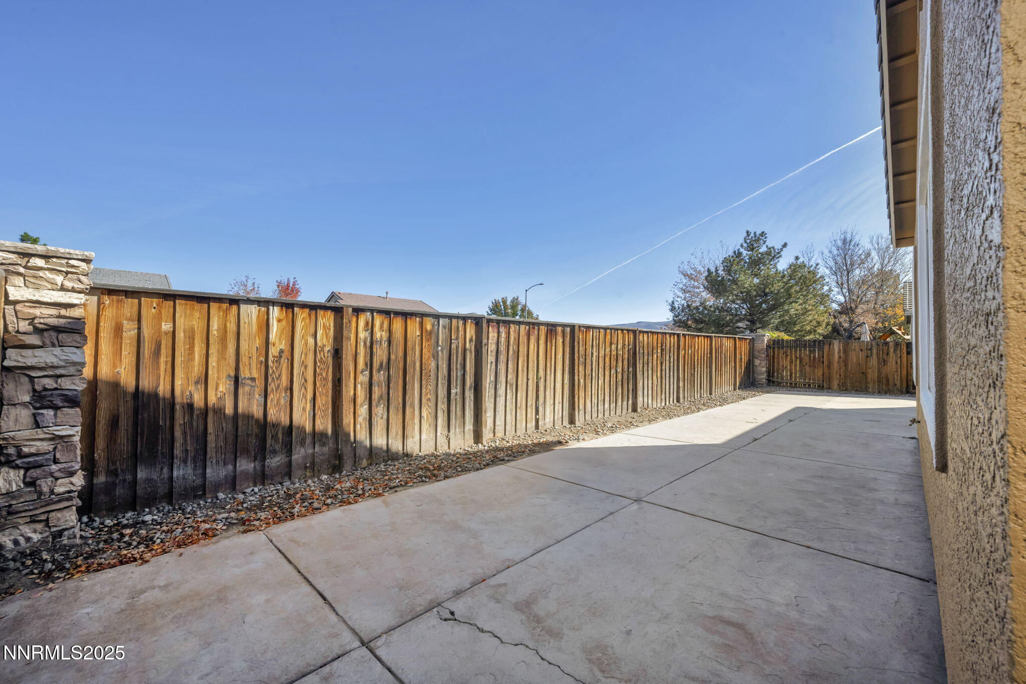 1781 Emerald Bay Drive Reno, NV 89521 - Photo 34 of 42 a view of backyard with staircase and wooden fence