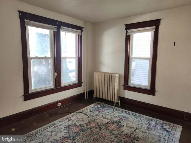 a view of an empty room and window