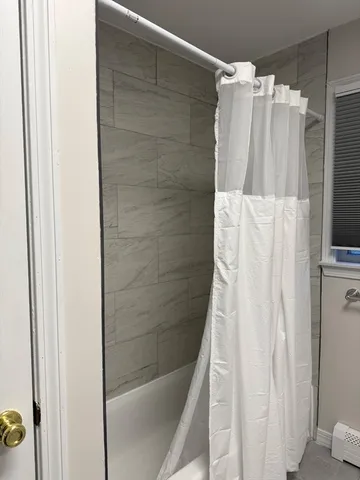 a bathroom with a bathtub