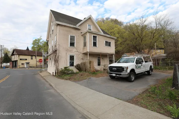 a car parked in front of a house
