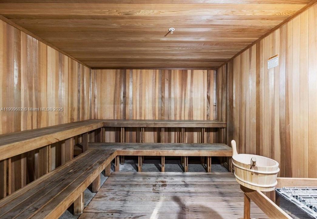 2950 Northeast 188th Street, Unit 501 Aventura, FL 33180 - Photo 12 of 46 a living room with furniture and a window