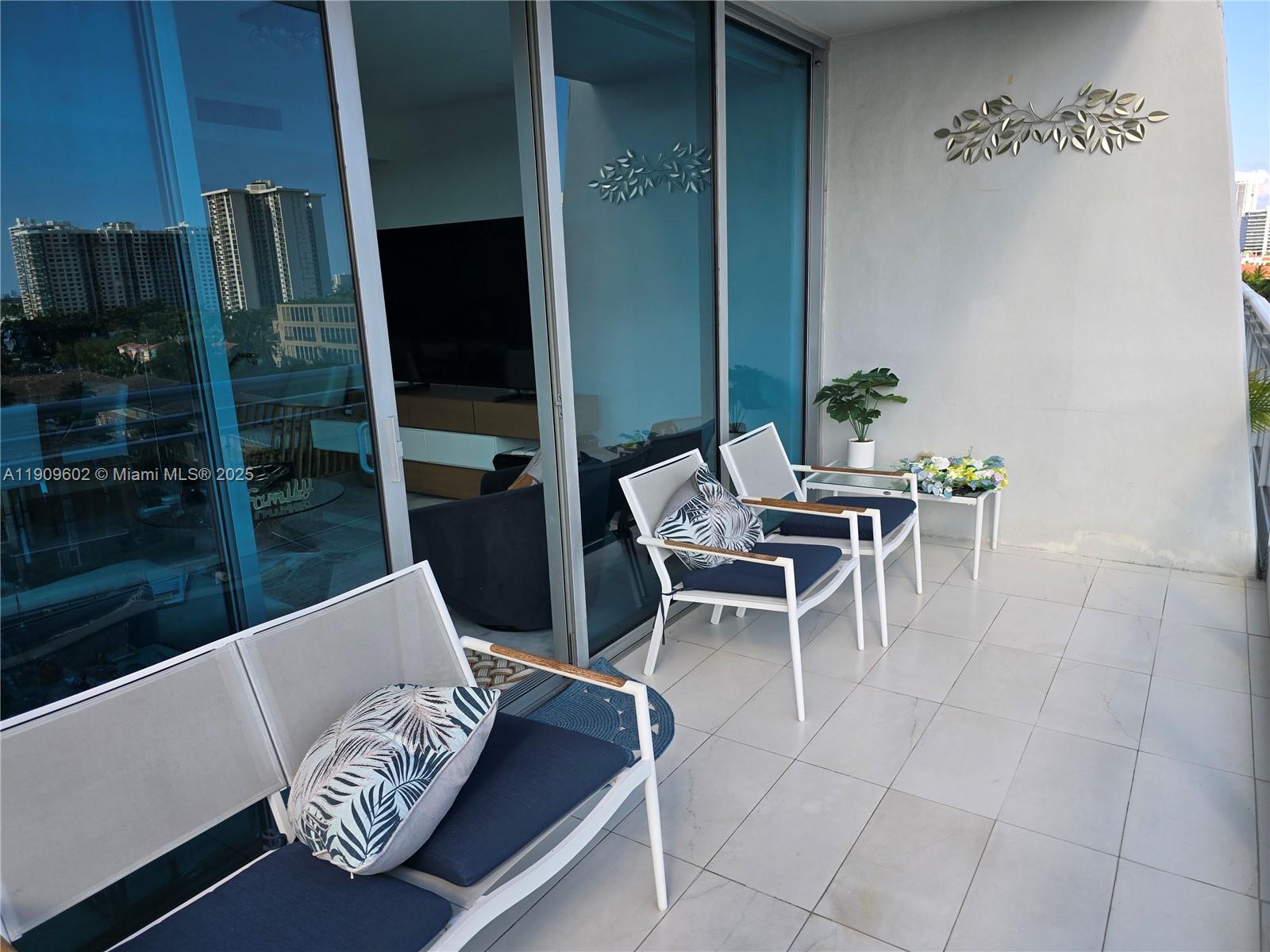 2950 Northeast 188th Street, Unit 501 Aventura, FL 33180 - Photo 25 of 46 a living room with furniture