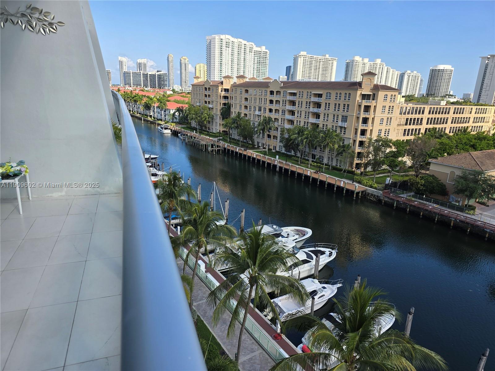 2950 Northeast 188th Street, Unit 501 Aventura, FL 33180 - Photo 26 of 46 a view of a city with a lake