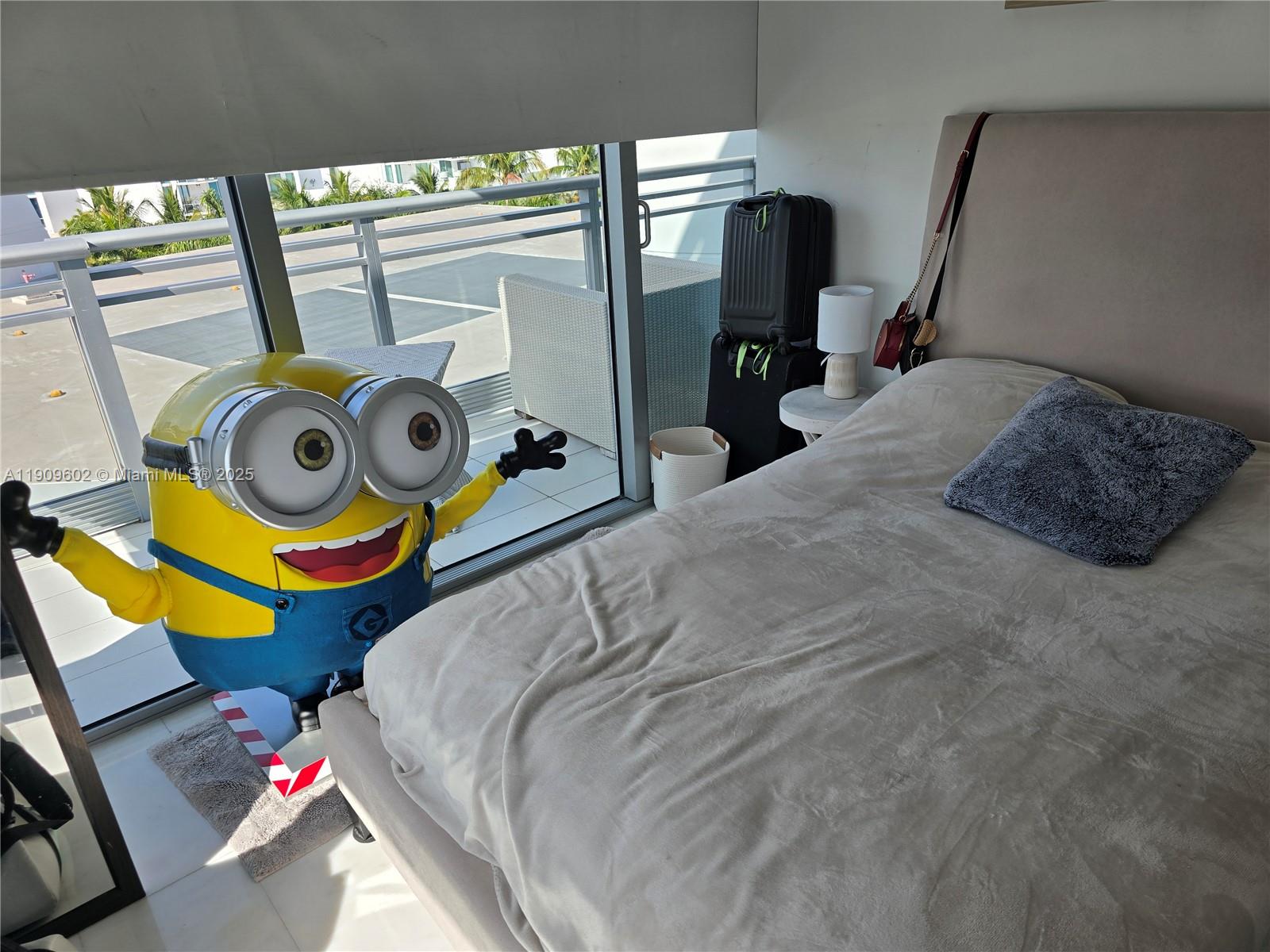 2950 Northeast 188th Street, Unit 501 Aventura, FL 33180 - Photo 30 of 46 a bedroom with a bed and teddy bear on bed