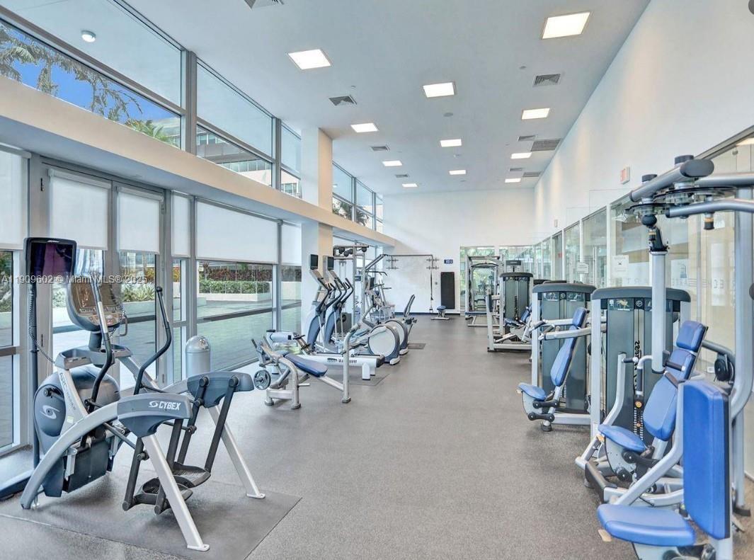 2950 Northeast 188th Street, Unit 501 Aventura, FL 33180 - Photo 7 of 46 a view of a room with gym equipment