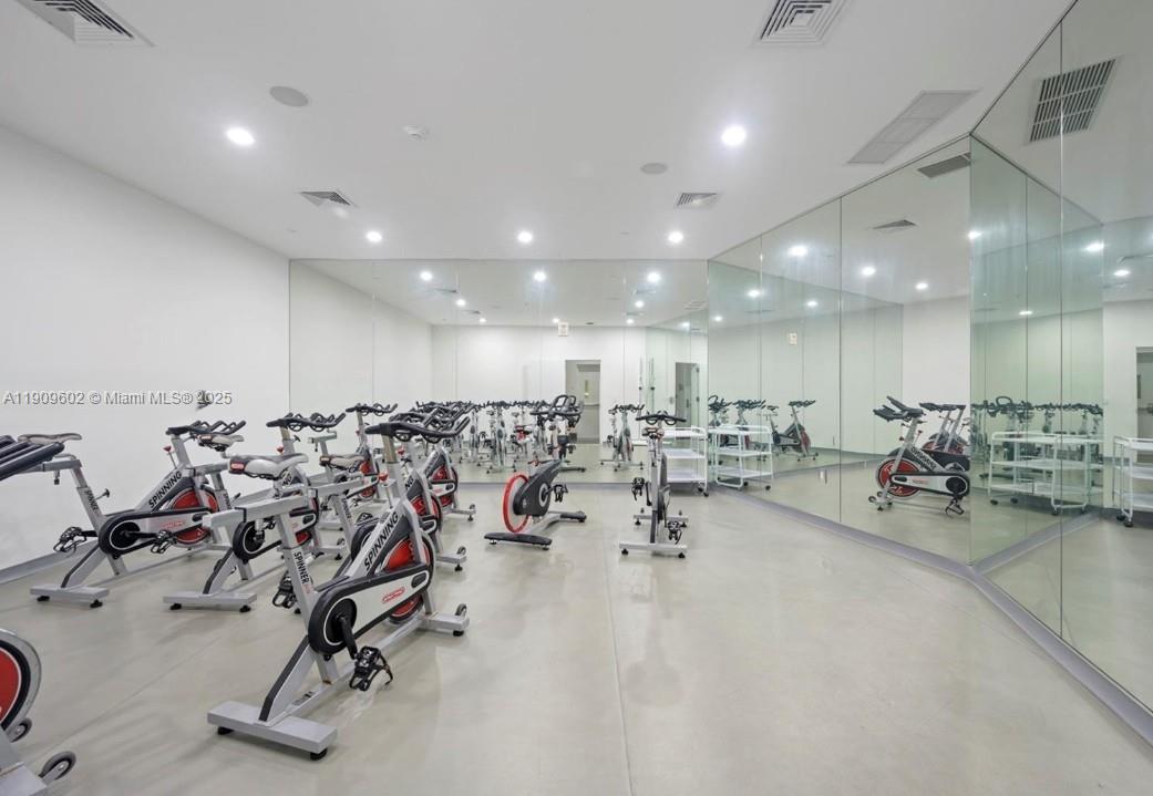 2950 Northeast 188th Street, Unit 501 Aventura, FL 33180 - Photo 9 of 46 a view of a room with gym equipment