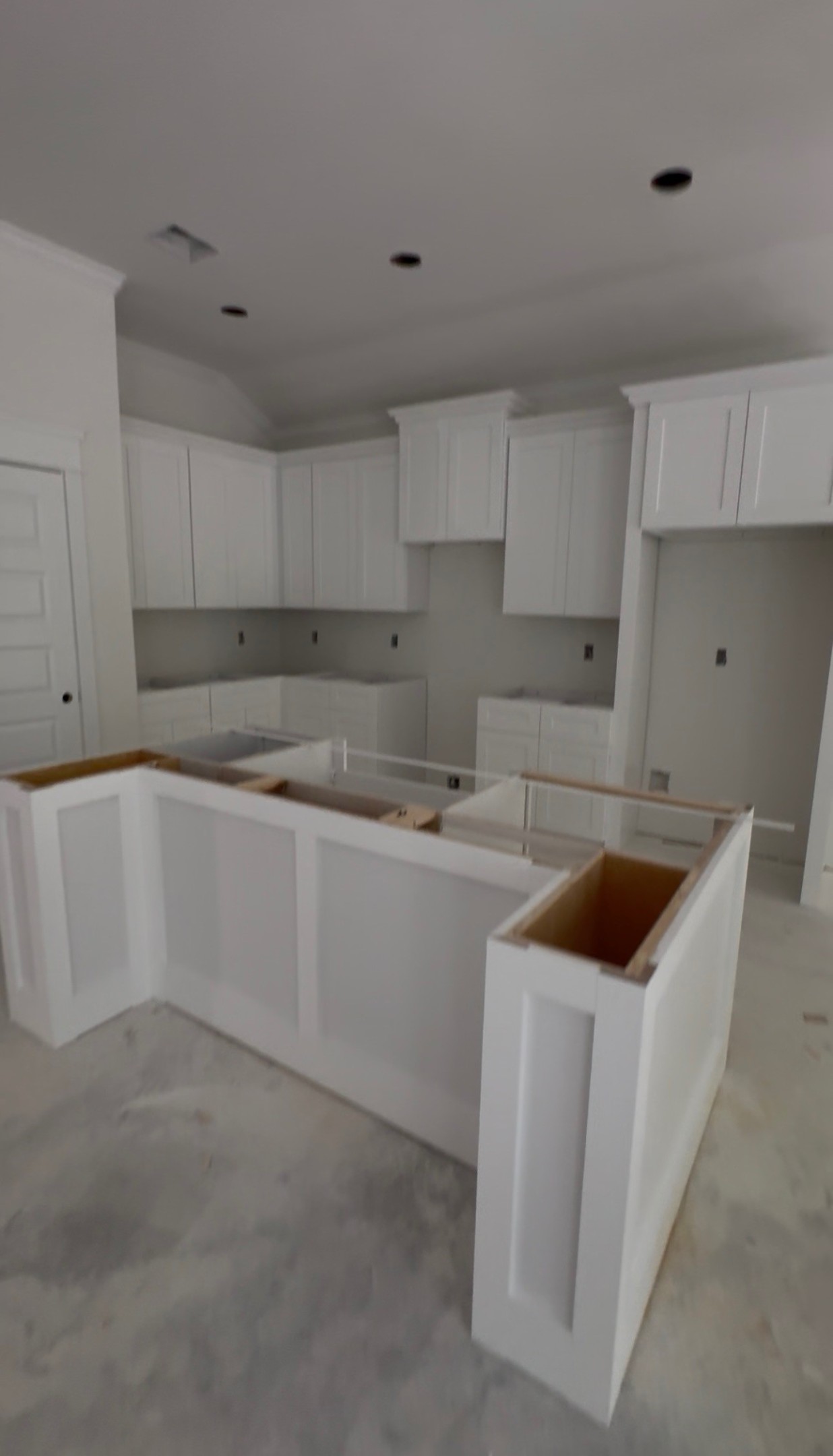 241 Clear Springs Trinity, TX 75862 - Photo 40 of 46 a kitchen that has a sink in it and white cabinets