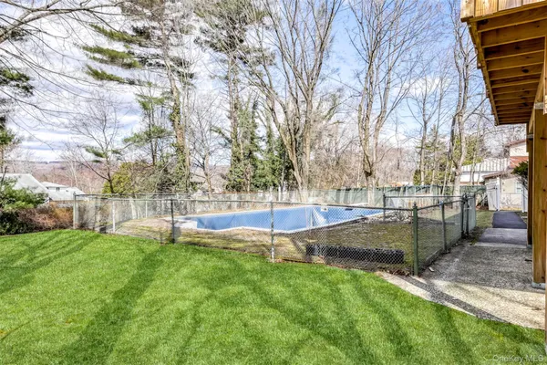 a view of backyard with green space