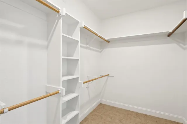 a view of an empty walk in closet