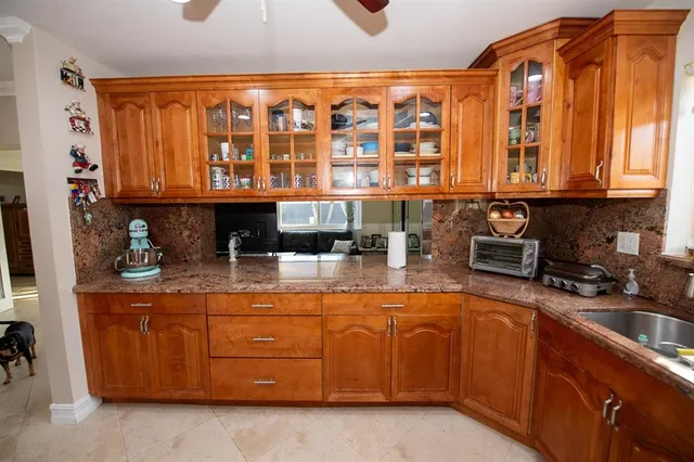 a view of a livingroom with furniture and a window