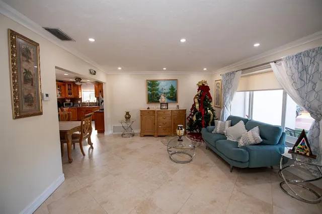 a view of a livingroom from a hallway