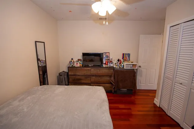 a bathroom that has a glass shower door