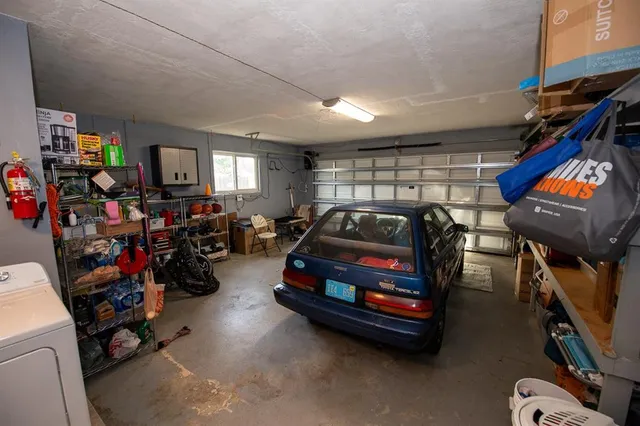 a view of a house with backyard