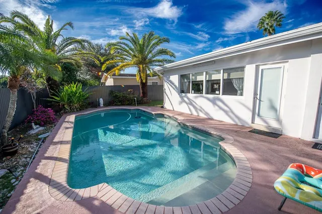 a view of a balcony with plants