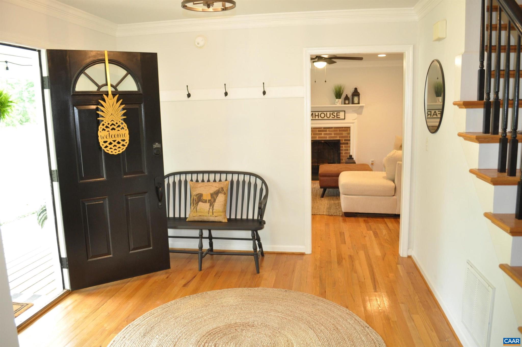 3257 Martin Kings Road Charlottesville, VA 22902 - Photo 4 of 49 a bedroom with a bed and a chair