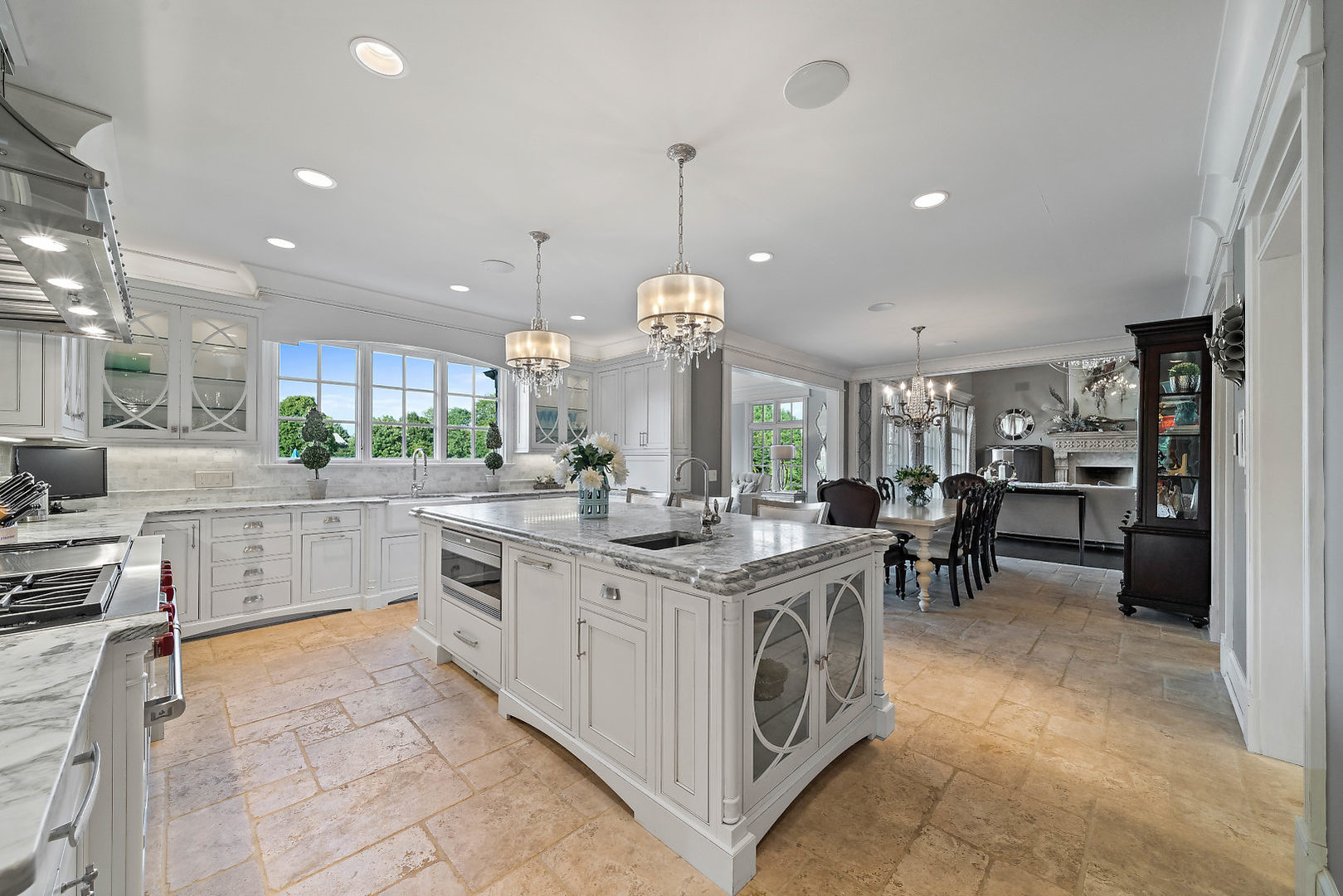 36W516 Hunters Gate Road St. Charles, IL 60175 - Photo 11 of 47 a kitchen with stainless steel appliances granite countertop counter space a sink and cabinets