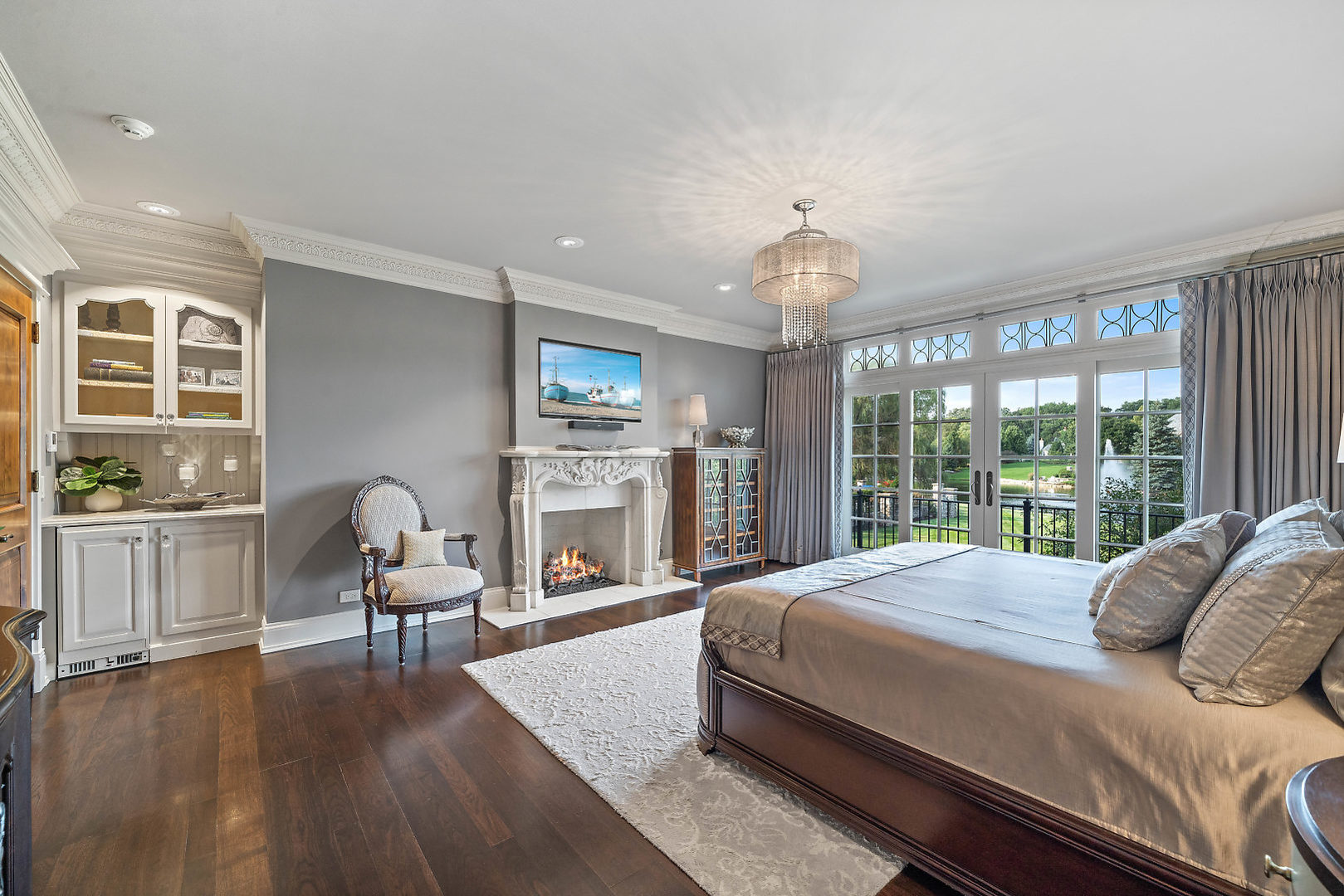 36W516 Hunters Gate Road St. Charles, IL 60175 - Photo 22 of 47 a bedroom with a bed and a large window