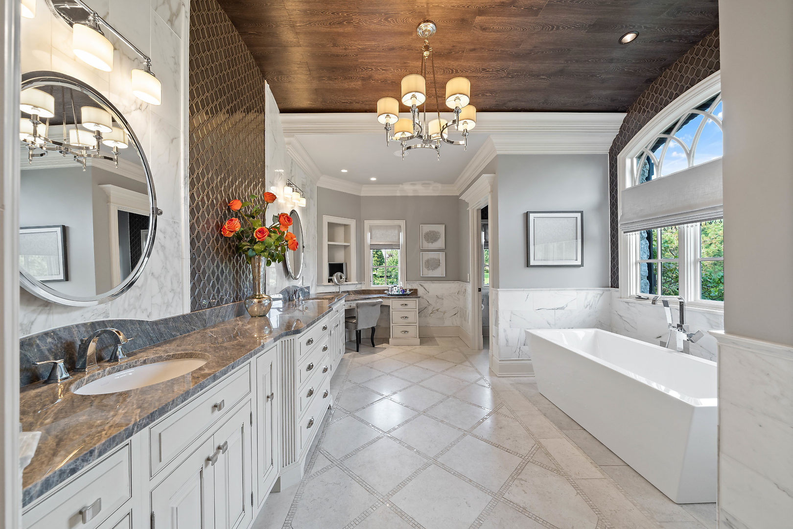36W516 Hunters Gate Road St. Charles, IL 60175 - Photo 24 of 47 a spacious en suite bathroom with double vanity a mirror a vanity and a bathtub