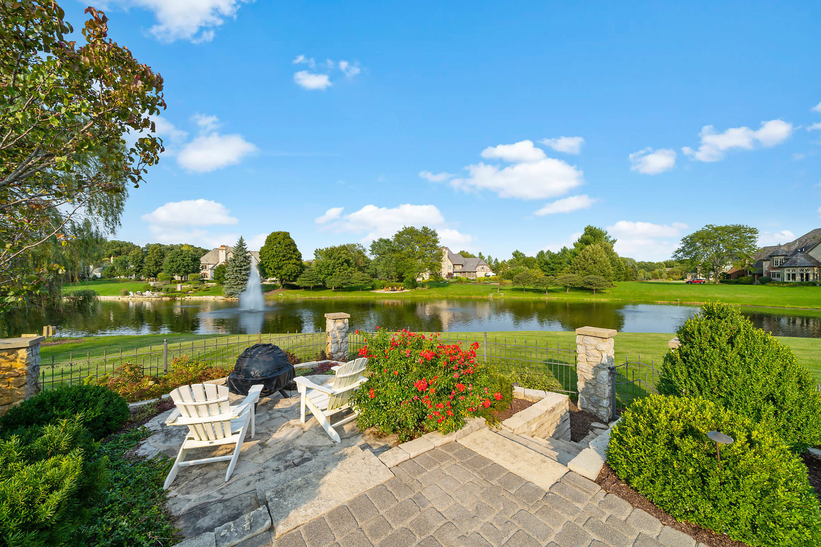 36W516 Hunters Gate Road St. Charles, IL 60175 - Photo 44 of 47 a view of a lake with a garden