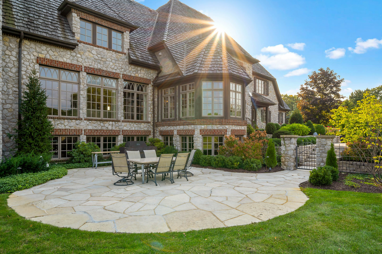 36W516 Hunters Gate Road St. Charles, IL 60175 - Photo 46 of 47 a building outdoor space with patio furniture and garden